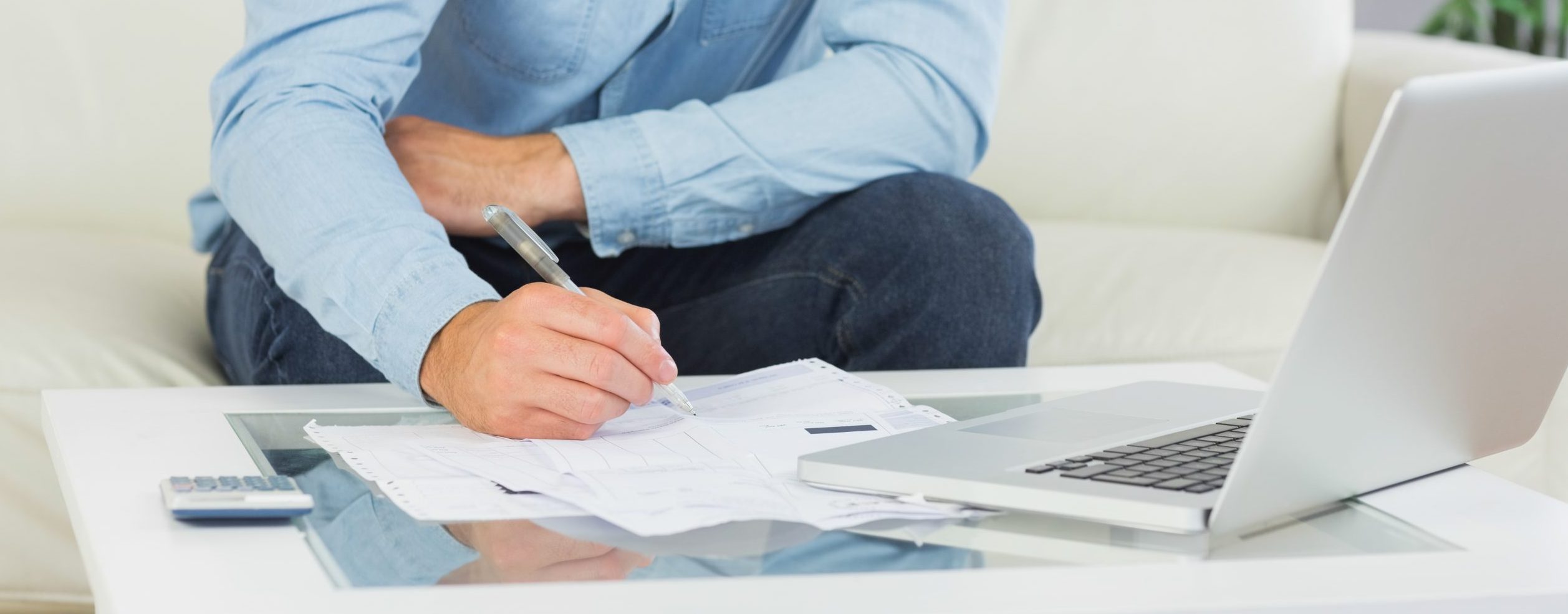 close-up-man-researching house prices