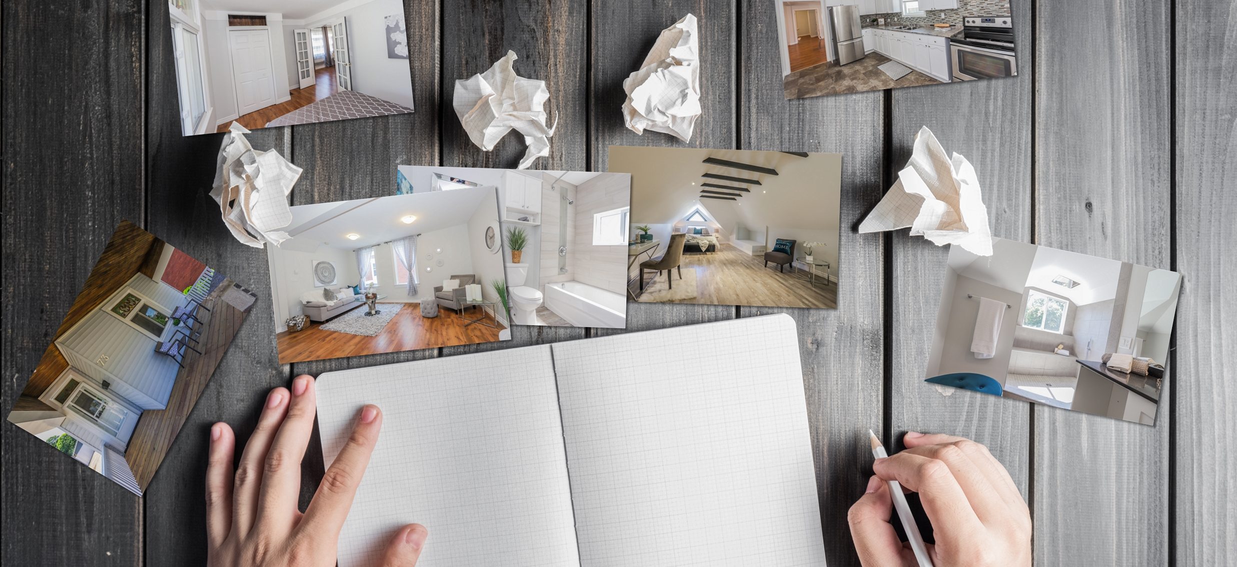 holding pencil beside blank notebook with crumpled papers and scattered photos trying to sell a property without an agent